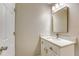 Bathroom featuring a white sink vanity, modern faucet, and a framed mirror with vanity lighting at 4061 Preserve Trl, Snellville, GA 30039