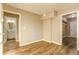 Bedroom showcasing wood flooring, natural light, and access to both a bathroom and a closet at 4061 Preserve Trl, Snellville, GA 30039