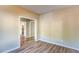 A bedroom featuring wood floors and neutral paint at 4061 Preserve Trl, Snellville, GA 30039