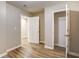 Bedroom with closet featuring fresh paint and faux-wood floors at 4061 Preserve Trl, Snellville, GA 30039