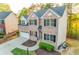 A charming two-story brick home featuring well-maintained landscaping and a two-car garage at 4061 Preserve Trl, Snellville, GA 30039
