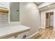 Hallway featuring fresh paint and faux-wood floors at 4061 Preserve Trl, Snellville, GA 30039