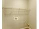 Neutral tone laundry room with wire shelving, and a view to the right at 4061 Preserve Trl, Snellville, GA 30039