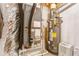 Utility room with a water heater, air handler, and a filter for air purification at 4061 Preserve Trl, Snellville, GA 30039