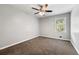 Cozy bedroom with neutral carpet and natural light at 1152 Bailing Dr, Lawrenceville, GA 30043
