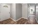 Inviting entryway with hardwood floors leading into the kitchen at 1152 Bailing Dr, Lawrenceville, GA 30043
