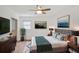 Stylish primary bedroom featuring a modern bed, sleek furnishings, mounted TV, and calming wall art for a relaxing retreat at 5306 Corinth Cir, Stone Mountain, GA 30087