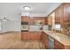 Updated kitchen featuring stainless steel appliances, granite countertops, and modern finishes, designed for functionality and style at 5306 Corinth Cir, Stone Mountain, GA 30087