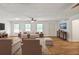 Inviting living room with hardwood floors, neutral tones, modern furnishings, and a cozy atmosphere at 5306 Corinth Cir, Stone Mountain, GA 30087
