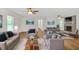 Spacious living area features hardwood floors, lots of seating, and abundant natural light, creating a warm atmosphere at 5306 Corinth Cir, Stone Mountain, GA 30087