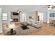 Bright living room boasts a cozy fireplace, neutral decor, and ample seating, perfect for relaxation and entertaining at 5306 Corinth Cir, Stone Mountain, GA 30087