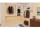 Spacious walk-in closet equipped with multiple shelving and hanging storage spaces at 5306 Corinth Cir, Stone Mountain, GA 30087