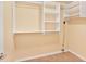 Clean walk-in closet with wall to wall shelving for ample storage at 5306 Corinth Cir, Stone Mountain, GA 30087