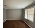 Hardwood floors and natural light fill this cozy bedroom at , Covington, GA 30014