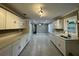 Bright, spacious kitchen featuring modern cabinets, countertops, and an undermount sink at , Covington, GA 30014