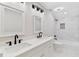 Modern bathroom featuring a double sink vanity, a bathtub-shower combo, and a toilet at 100 Little Ridge Rd, Berkeley Lake, GA 30096