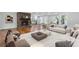 Open floor plan featuring living room with stone fireplace, hardwood floors and modern decor at 100 Little Ridge Rd, Berkeley Lake, GA 30096