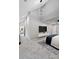 Spacious main bedroom featuring modern lighting, ceiling fan, sitting area, and ample windows at 100 Little Ridge Rd, Berkeley Lake, GA 30096