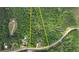 An aerial view shows property lines and the residence surrounded by dense trees at 1080 Gaithers Rd, Mansfield, GA 30055