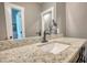 Stylish bathroom vanity with modern fixtures and ample counter space at 1080 Gaithers Rd, Mansfield, GA 30055
