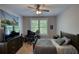Inviting bedroom with a large window and comfortable bed at 1080 Gaithers Rd, Mansfield, GA 30055
