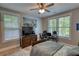 Bedroom featuring a large window and a ceiling fan at 1080 Gaithers Rd, Mansfield, GA 30055