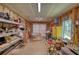 Spacious garage featuring a lot of storage and shelving; a versatile space for projects and organization at 1080 Gaithers Rd, Mansfield, GA 30055