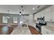 Modern kitchen with stainless steel appliances, a center island, and ample cabinet space at 1280 Sw Vonda Ln, Mableton, GA 30126