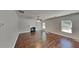 Bright living room featuring a fireplace, hardwood floors, and large windows at 1280 Sw Vonda Ln, Mableton, GA 30126