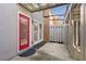 Private patio with a red door, fenced-in yard and pergola at 3476 Silver Maple Dr, Duluth, GA 30096