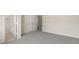 Neutral carpeted bedroom includes a closet, access to the bathroom, and views of the staircase at 3476 Silver Maple Dr, Duluth, GA 30096