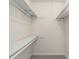 Walk-in closet features built-in shelving for optimal organization and storage at 3476 Silver Maple Dr, Duluth, GA 30096