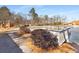 Scenic view of the lake and a bridge to the island along the community walking path at 3476 Silver Maple Dr, Duluth, GA 30096