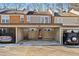 Carport parking with a view of the red front door in the middle at 3476 Silver Maple Dr, Duluth, GA 30096