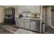 Charming kitchen featuring painted cabinets, stainless steel appliances, and butcher block counters at 522 Plantation Creek Dr, Loganville, GA 30052