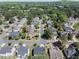 Aerial view of neighborhood showing mature trees and well-maintained homes at 1553 Pinebreeze Dr, Marietta, GA 30062