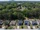 Charming neighborhood aerial view highlighting tree coverage and well-maintained homes with driveways at 1553 Pinebreeze Dr, Marietta, GA 30062