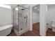 Bathroom featuring freestanding tub, tiled shower, and access to walk-in closet at 1553 Pinebreeze Dr, Marietta, GA 30062