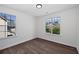 Bedroom with two large windows and laminate wood flooring at 1553 Pinebreeze Dr, Marietta, GA 30062