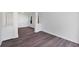 Open-concept dining area with hardwood floors and white wainscoting at 1553 Pinebreeze Dr, Marietta, GA 30062