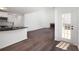 Open kitchen featuring stainless steel appliances, granite countertops, and an open view to the living room at 1553 Pinebreeze Dr, Marietta, GA 30062