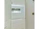Bathroom view featuring a shower and glimpse into the bedroom space through the doorway at 305 Stonecliff Ct, Stone Mountain, GA 30083