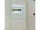 View of the bedroom with a large window and the ensuite bathroom at 305 Stonecliff Ct, Stone Mountain, GA 30083