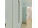 Hallway featuring a doorway to the bathroom and closet space at 305 Stonecliff Ct, Stone Mountain, GA 30083