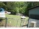 Spacious yard featuring a wooden fence, shed and a utility tank at 31 Dogwood Nw Ln, Cartersville, GA 30121