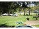 Spacious backyard featuring mature trees, swing set and a grassy lawn at 31 Dogwood Nw Ln, Cartersville, GA 30121