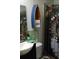 A compact bathroom featuring unique boat shelf and decorative shower curtain at 31 Dogwood Nw Ln, Cartersville, GA 30121