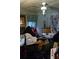 Cluttered room featuring a ceiling fan and various items, with renovation potential at 31 Dogwood Nw Ln, Cartersville, GA 30121