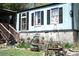 Charming single-story home featuring light blue siding and a covered porch, complemented by an inviting outdoor landscape at 31 Dogwood Nw Ln, Cartersville, GA 30121