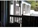 View from the porch of the side of the home, showing siding, windows, and trim at 31 Dogwood Nw Ln, Cartersville, GA 30121